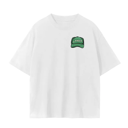 White crew neck t-shirt with a graphic print of a cartoonish ranger with a hat, surrounded by abstract designs and text that reads 'only you can prevent slow play'. The t-shirt displays a relaxed fit design with a drop shoulder.