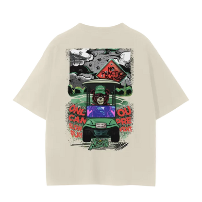 Beige t-shirt with a colorful graphic of a bear in a car on the back, on a white background.