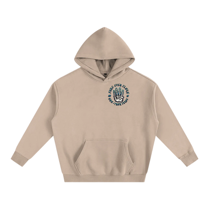 A white hooded sweatshirt with 'The Eye of the Fly' logo on the front and 'GRIT CITY' text on the sleeve.