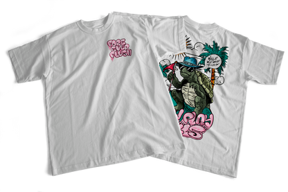 A white crew neck t-shirt with a graphic print of a turtle in a sun hat and sunglasses, playing a game of golf, and the text 'SLOW PLAY KILLS' below it.