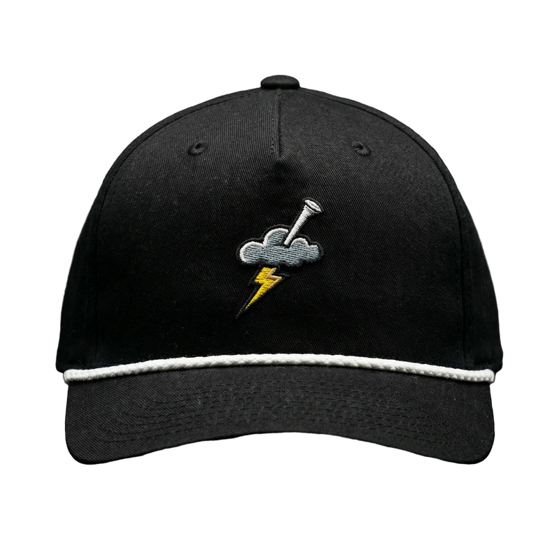 Black cap with embroidered design on a black background